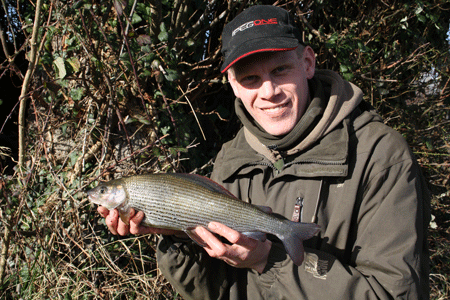 Alan Blair shows his best grayling. Get our mag to see much bigger ones!