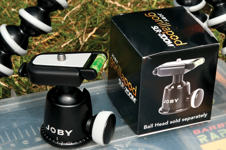 4. The other useful addition is the Gorillapod Ball Head, which screws on the tripod. Thumbscrew adjustment allows the camera to be set absolutely flat, with a spirit level indicator telling you instantly which way you need to adjust. Once the camera is stable and flat I position the mat in front of the camera, kneel in front of the mat and take a test shot to check for framing, zooming in or out as appropriate until it’s right. As long as you kneel on the edge of the mat in the same place when you bring your fish up the bank, you’re guaranteed a well composed self-portrait. The remote sits between finger and thumb on the hand nearest the pectoral fins. Press the button, hear a bleep as the D40 focuses on the fish and two seconds later you’ve got a great picture.