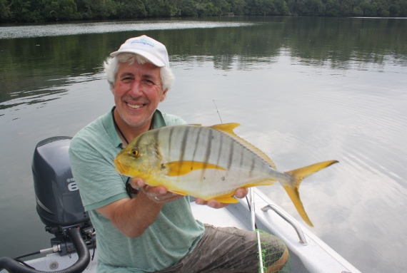 Martin-the-pom-Salter nets this beauty golden trevally down under.