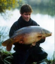 Mail reporter Ben Weir with a big carp from a small water.