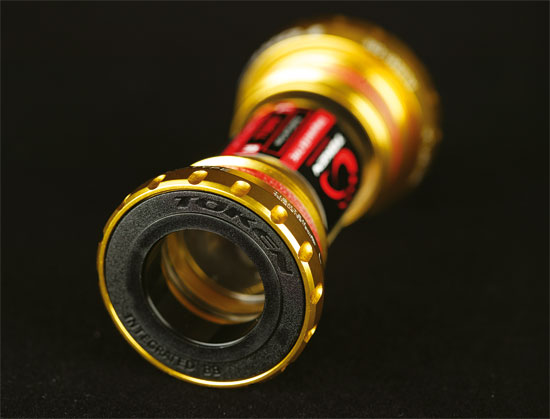 Token integrated EX-type bottom bracket