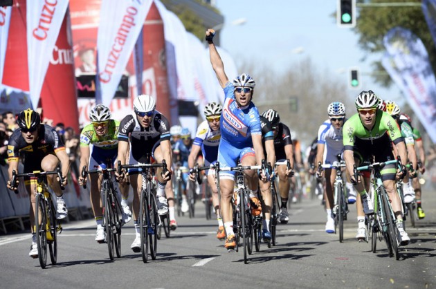 Roy Jans raises his hand thinking he has won stage 3 of the 2014 Ruta del Sol but actually the winner was Gerald Coilek