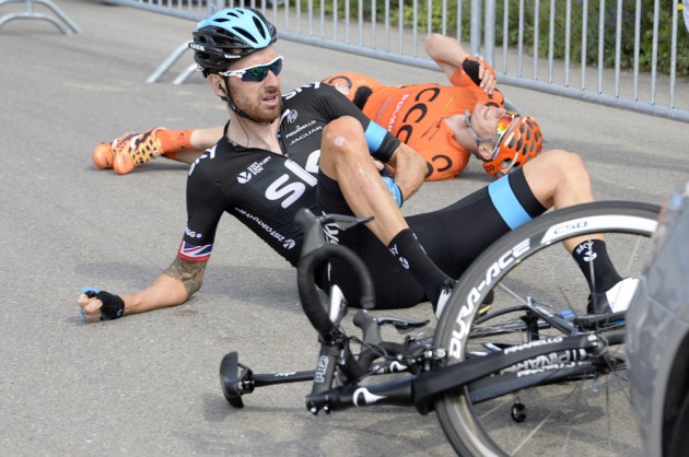 Bradley Wiggins crashes on stage four of the 2014 Tour de Suisse