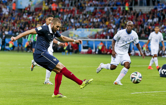 Karim Benzema smashes in his second and France's third goal of the tournament.