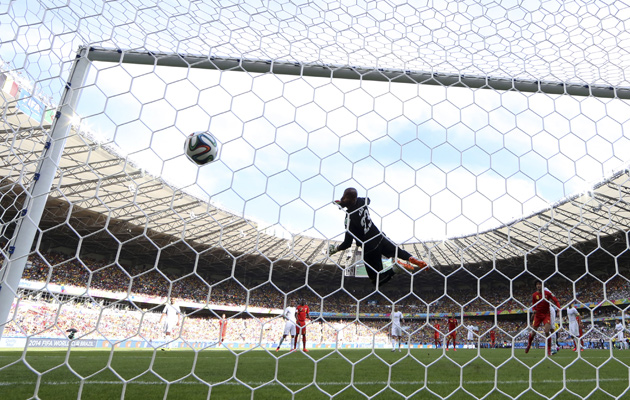 The view from behind the goal as Marouane Fellaini equalises for Belgium.
