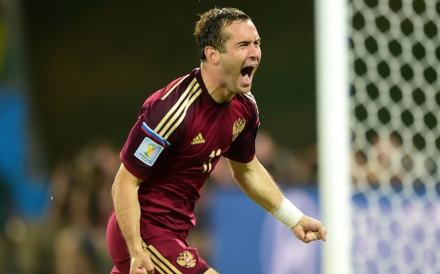 Russia's Aleksandr Kerzhakov celebrates scoring his side's equaliser.