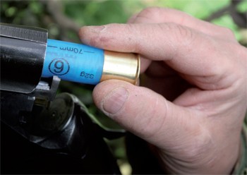 loading a cartridge-shotgun.jpg