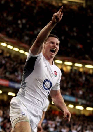 Ashton celebrates his first try