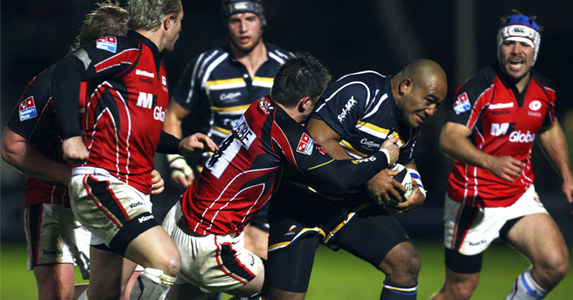 Tevita Taumoepeau of Worcester Warriors is tackled by Ernst Joubert of Saracens
