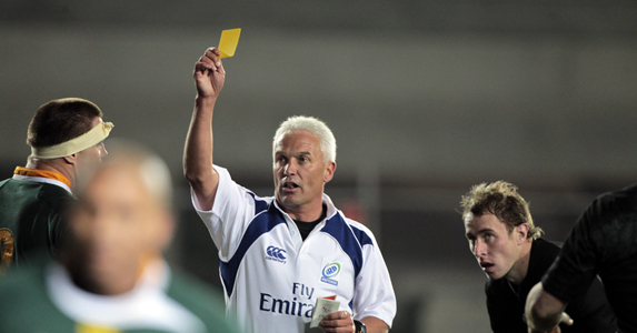 Alan Lewis shows yellow to Springbok Bakkies Botha during an international against New Zealand