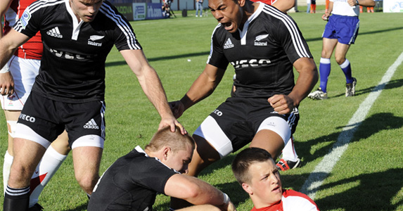 Charles Piutau (R) and Sam Cane of New Zealand celebrates after he scores a try against Wales