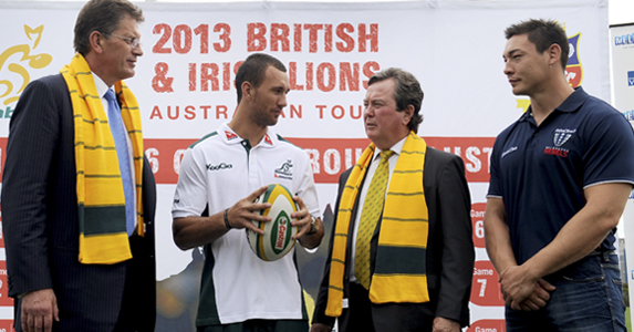 Victorian Premier Ted Baillieu (L) talks with Australian rugby union star Quade Cooper (2/L), ARU Managing Director and CEO John O’Neill (2/R) and Welsh international player Gareth Delve (R) at the 2013 Lions Tour
