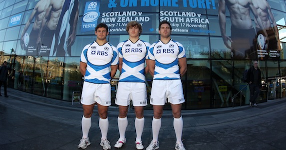 Flying the flag: Ross Ford, David Denton and Sean Lamont model the new Scotland change strip