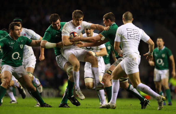 Carried away: Farrell in the 2012 match with Ireland