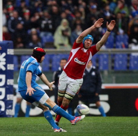Committment: Justin Tipuric tries a charge down