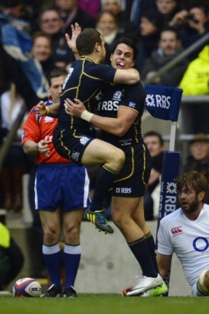 Sean Maitland celebrates his try with Greig Laidlaw (left)