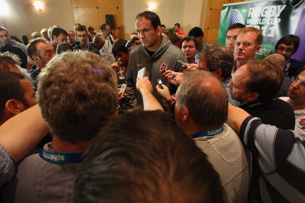 Media scrum: Martin Johnson had a tough RWC 2011