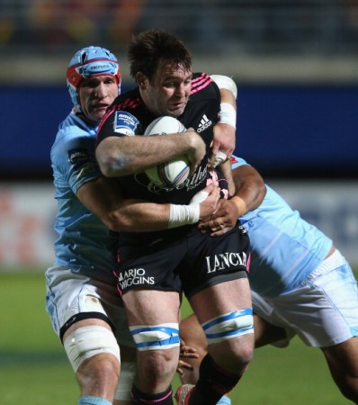 Rough rider: David Lyons bustles in the Challenge Cup semi-final
