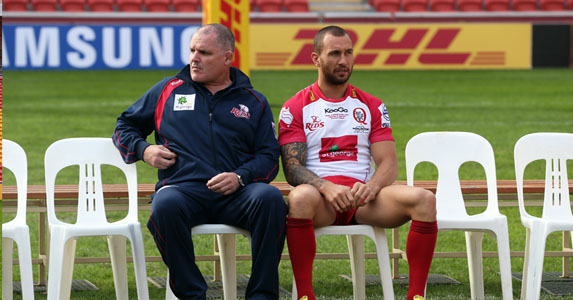 The calm before the storm: Ewen McKenzie and Quade Cooper take a chair before the rush of playing the Lions