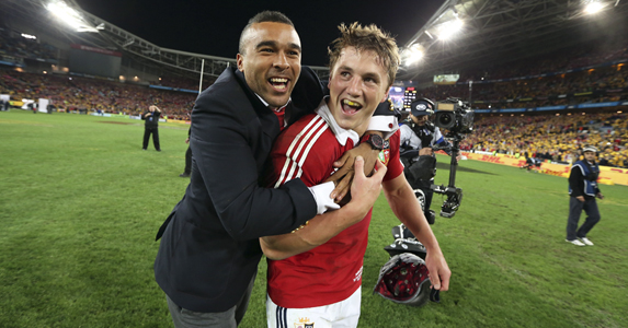 Happy chaps: Zebo and Jon Davies celebrate the Lions victory