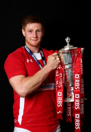 A helping hand: Dragons' captain Coombs
