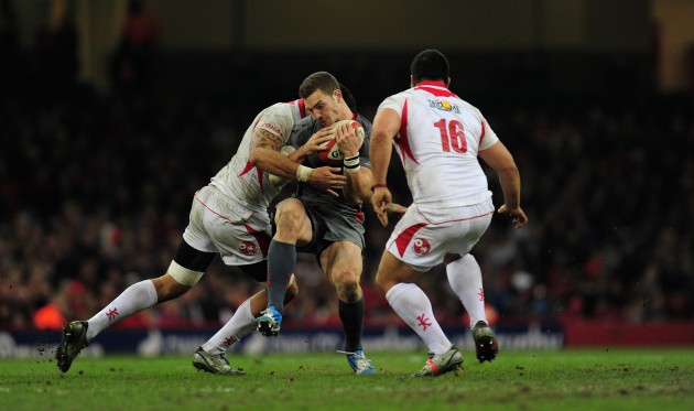 Unscathed: Welsh stars survived Tongan tackling