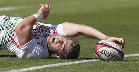 Touchdown: Phil Burgess scores for England v Wales