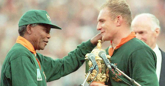 The iconic moment Nelson Mandela handed the Webb Ellis cup to Francois Pienaar, uniting South Africa in celebration
