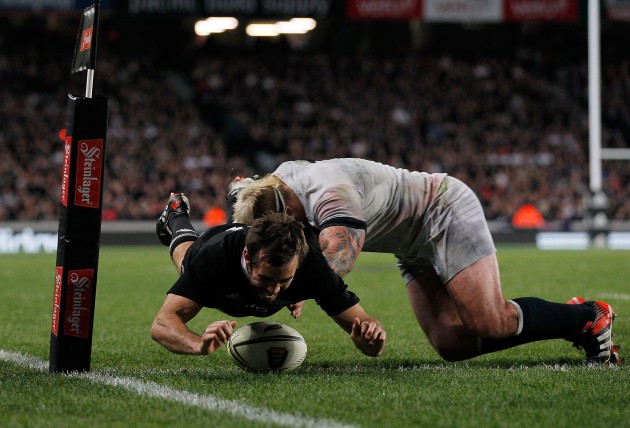 The deciding moment: Conrad Smith touches down to score the only try of the Test