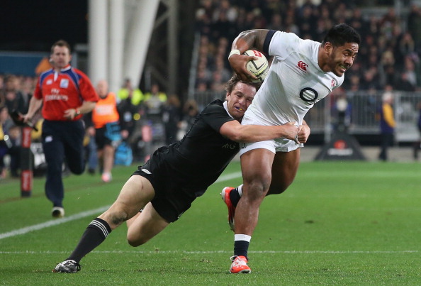 Brilliant Ben: All Blacks full-back Ben Smith makes his try-saving tackle on Manu Tuilagi